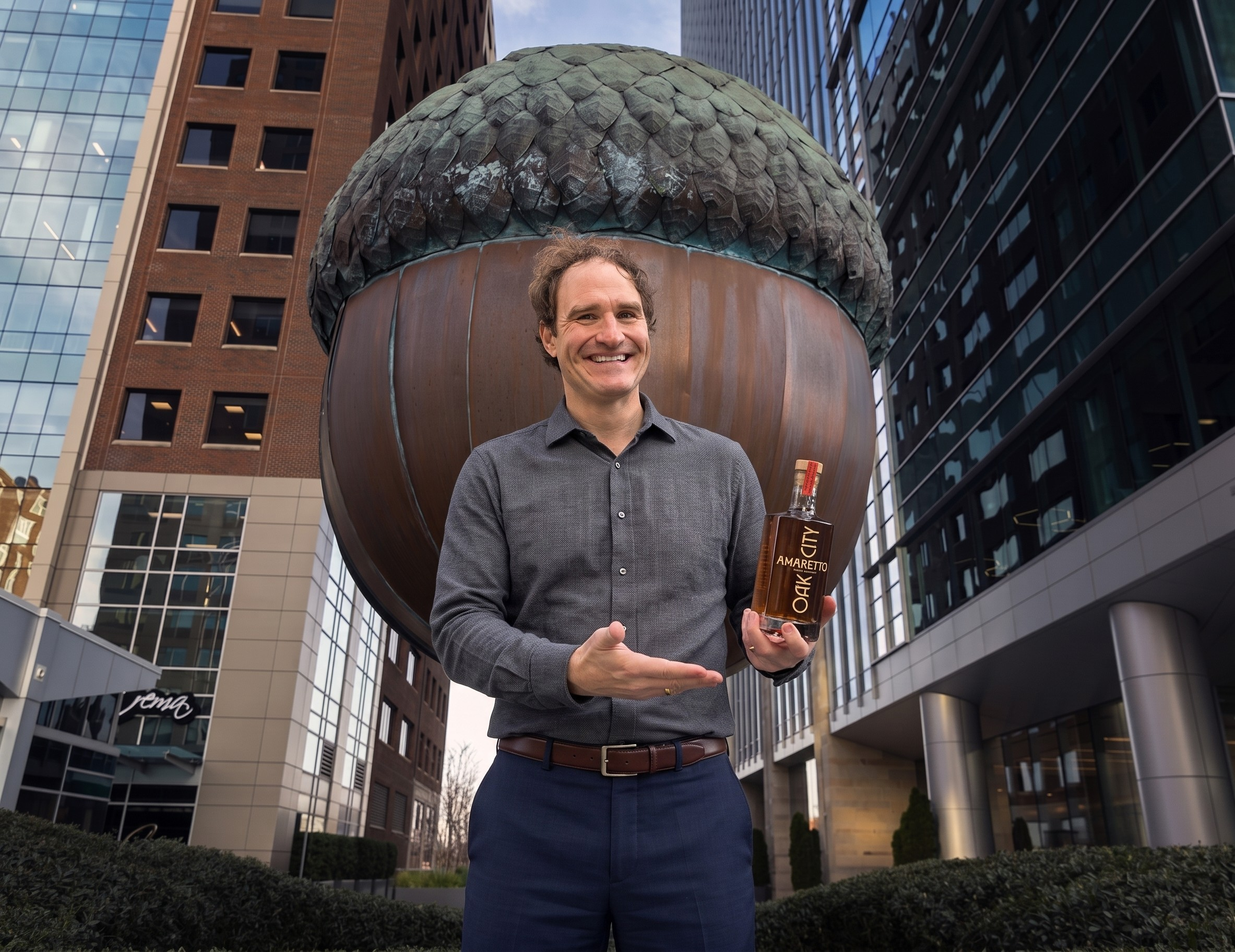 Anthony Scalabrino holding Oak City Amaretto